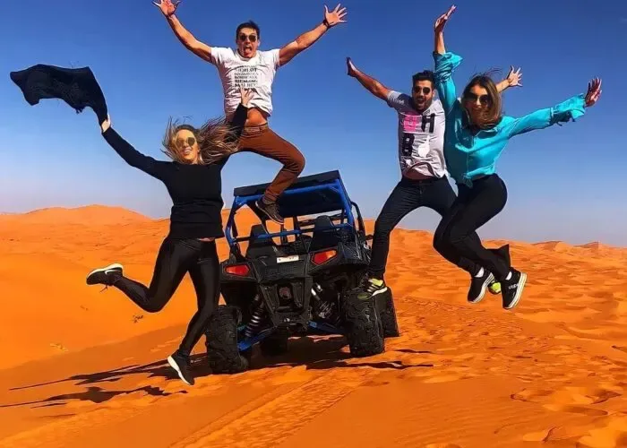 Quad bikes riding across the Erg Chebbi dunes in Merzouga
